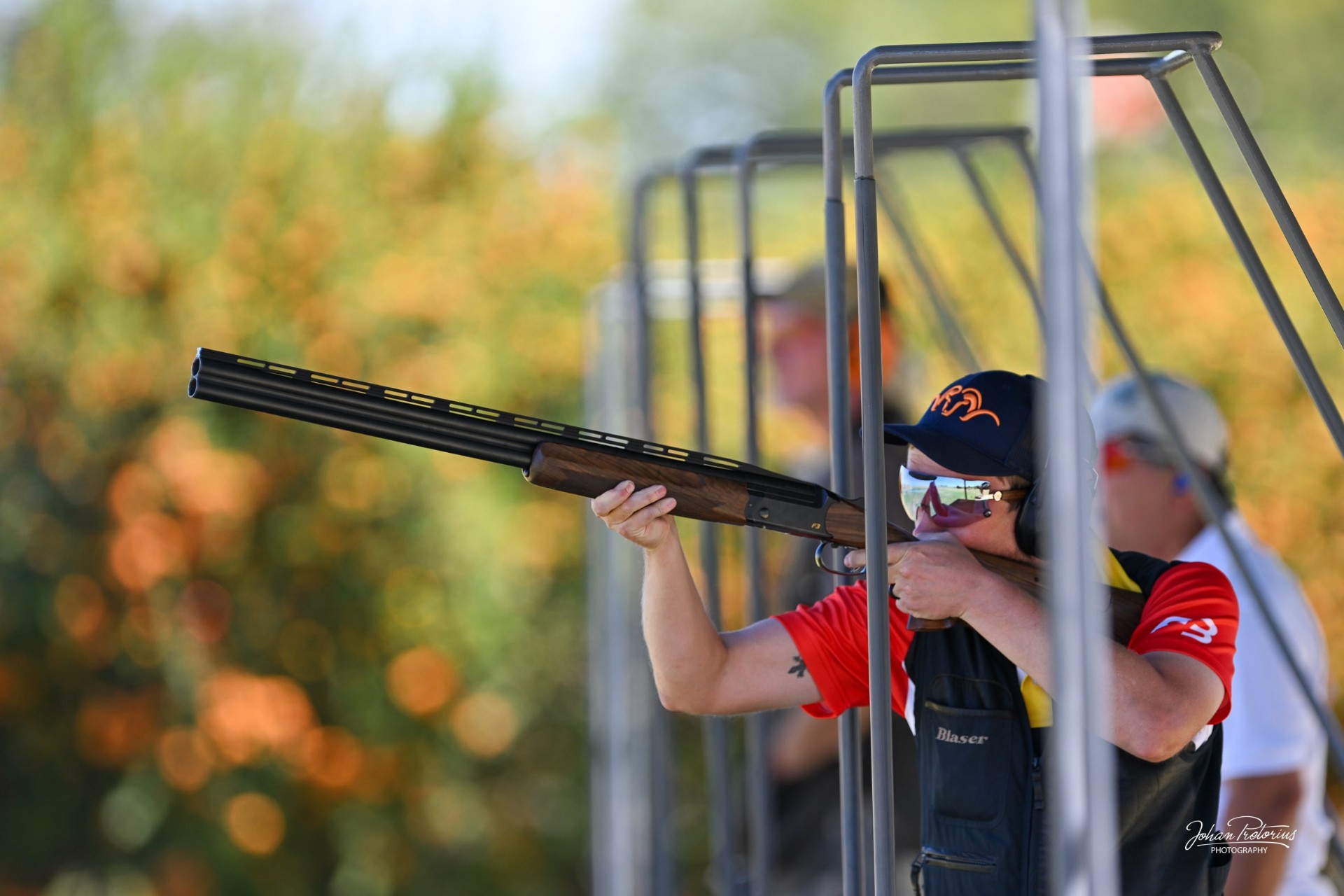 Compak Sporting shooters on the stands at a South African range