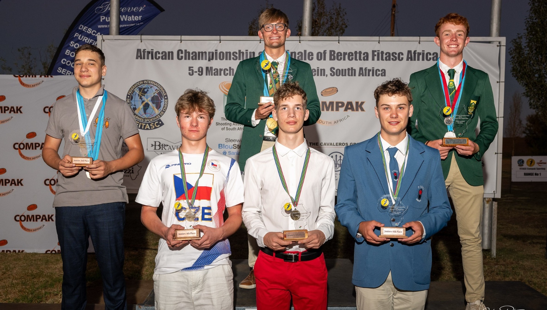 Young South African Compak Sporting shooters on the podium