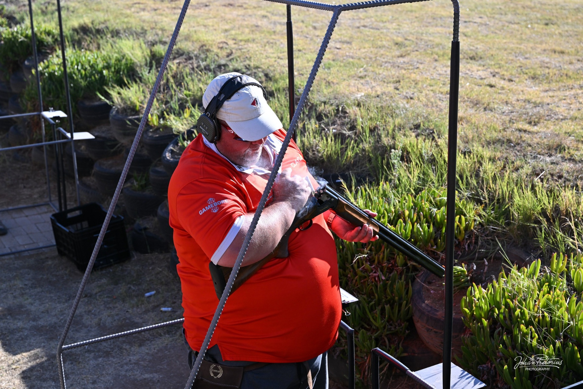 Compak Sporting shooters on the stands at a South African range