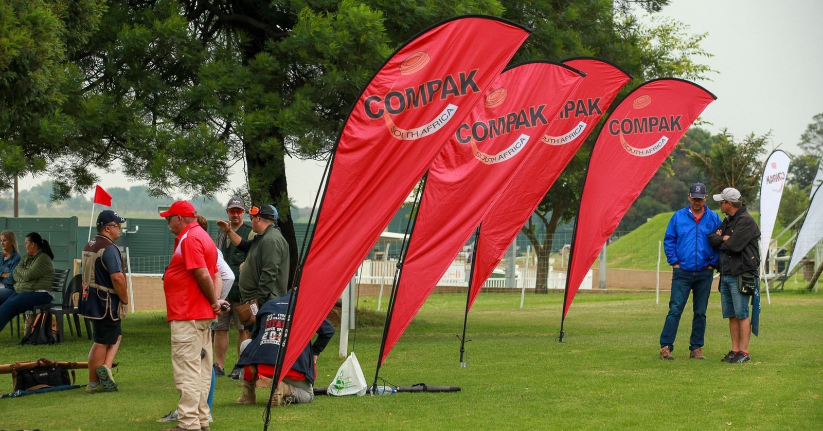 Compak Sporting shooters on the stands at a South African range